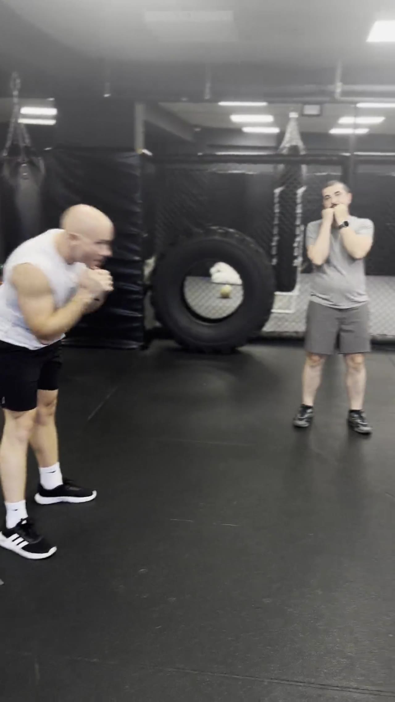 Archive video of a group working stance and guard in a striking class